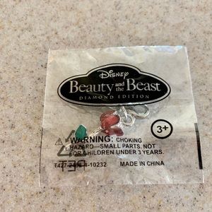 Brand new never opened Beauty and the Beast charm